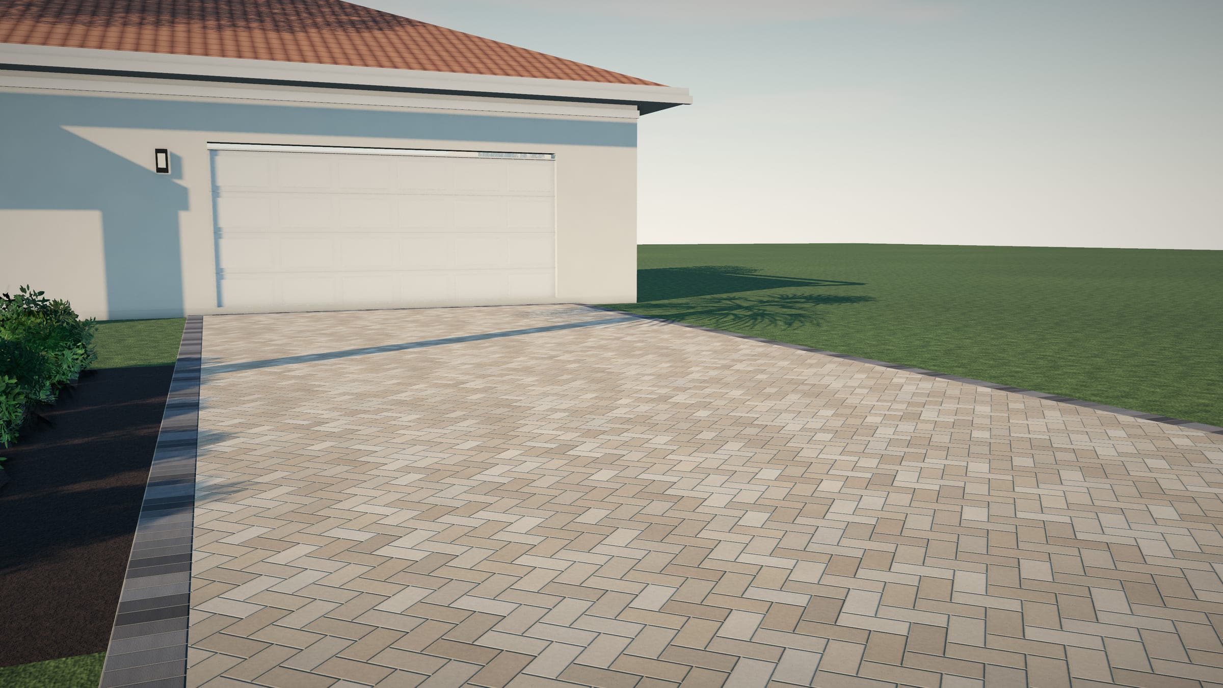 View up a 45-degree herringbone paver driveway with a charcoal soldier-course border toward a two-car garage.