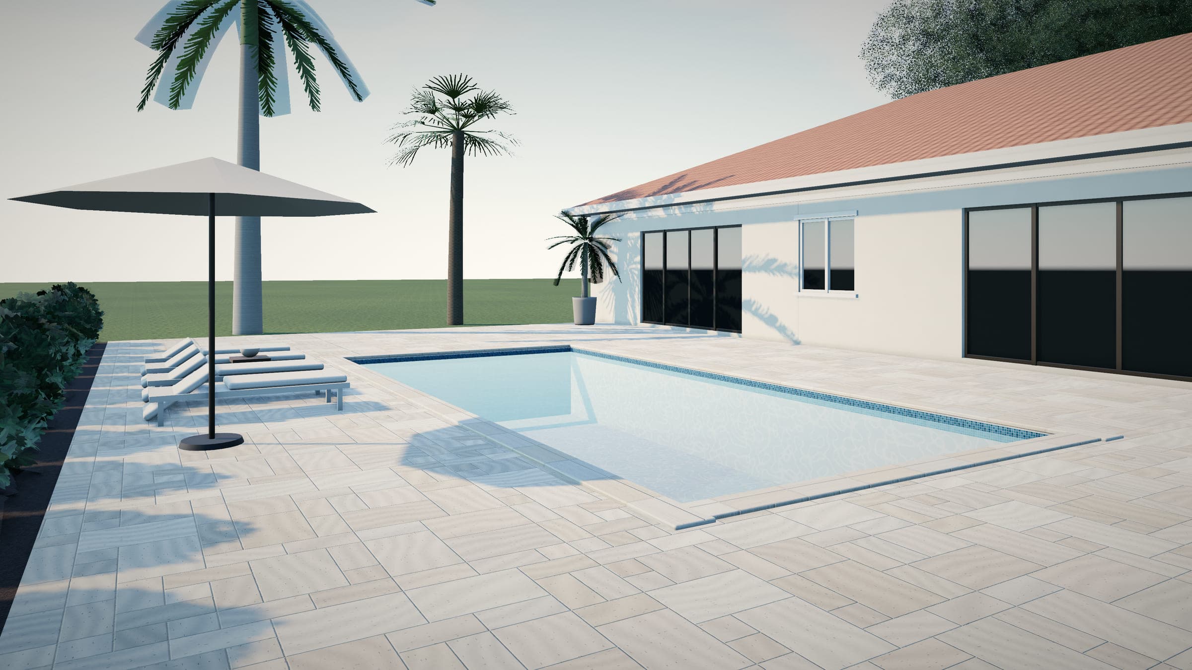 Rectangular pool surrounded by an ivory travertine deck laid in a French pattern, with lounge chairs and a market umbrella.