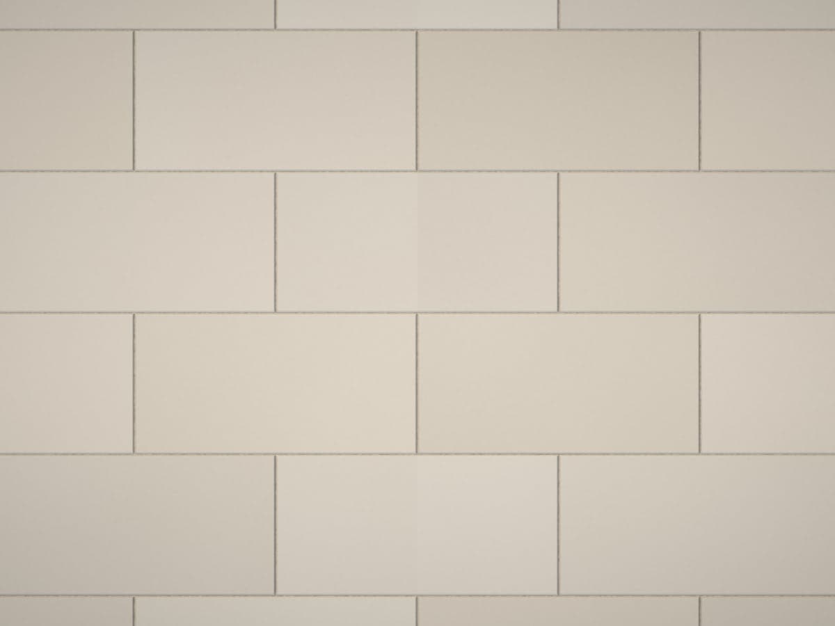 Light gray stone-look porcelain pavers with narrow, straight joints.